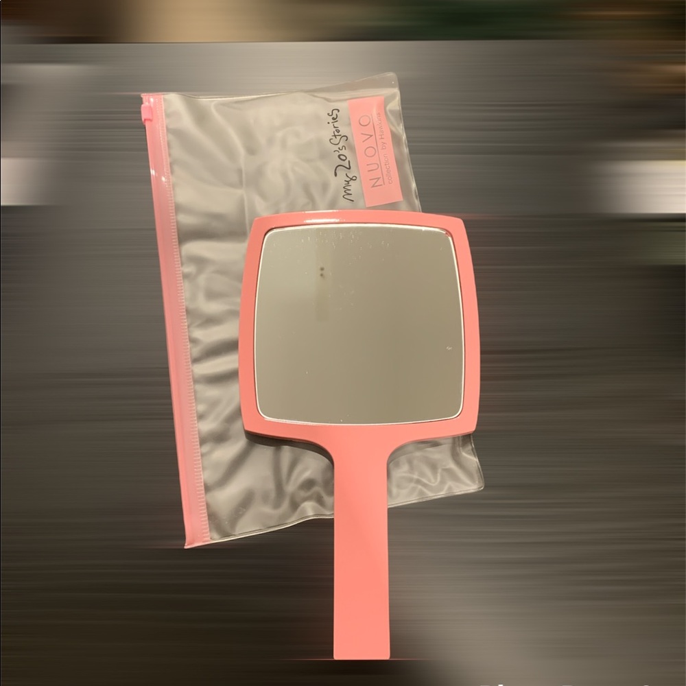 Hand held pink mirror with case